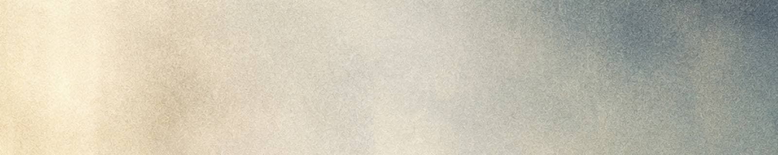 Une brume crème et bleutée, en texture granuleuse.