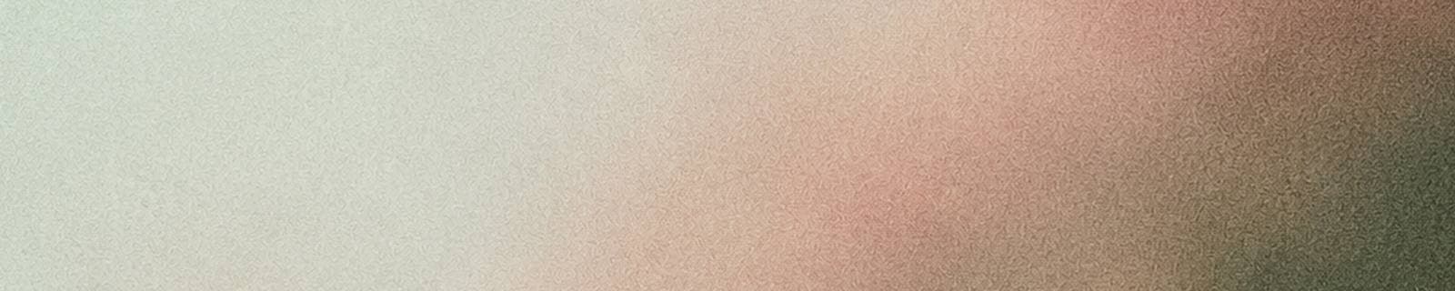 Un voile rose et vert pâle, en texture granuleuse.